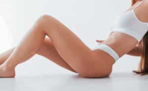 Woman with tight, slim body from Elixis body tightening in Ashburn, VA