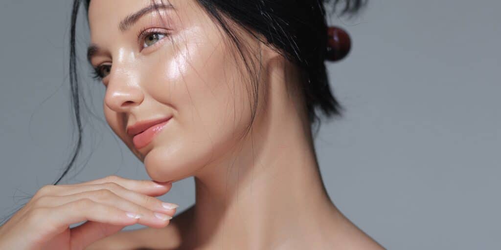 Woman with glowing skin after dermaplaning in Ashburn, VA